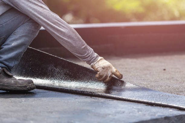 Professional Waterproofing technician working in Byron, NY